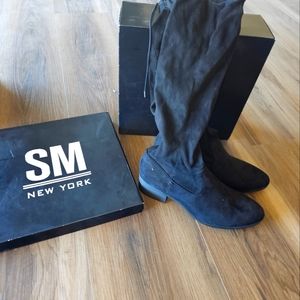 Knee high black boots